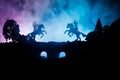 Medieval battle scene on bridge with cavalry and infantry. Silhouettes of figures as separate objects, fight between warriors on d Royalty Free Stock Photo