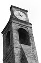 A medieval bell and clock tower of an ancient church Italy, Europe Royalty Free Stock Photo