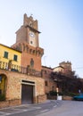 Medieval bell tower with clocks in the town of Marciano in Tuscany, Italia