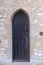 Medieval Black Church Door. Royalty Free Stock Photo