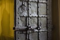 old wooden iron entrance door with antique door handle. old door handle for wooden gates