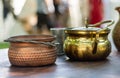 Vintage Brass Metal Pot on Wooden Desk - Medieval Cooking Concept Royalty Free Stock Photo