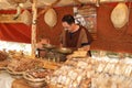 Medieval Bread stall at market.