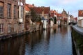 Old town Brugge Bruges, Belgium. Vintage architecture. Medieval brick buildings and bridge at canal street . Royalty Free Stock Photo
