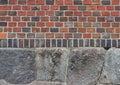 Medieval brickwork on stone foundations Royalty Free Stock Photo