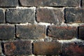 Medieval brickwork  wall of red black burnt bricks Royalty Free Stock Photo