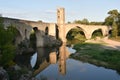 Eight arch bridge over the river with its reflection Royalty Free Stock Photo