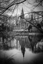 Medieval building Castle on Love lake, Minnewater Park in Bruges, Belgium in Black and White Royalty Free Stock Photo