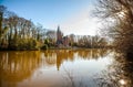 Medieval building (Castle) in Love lake, Minnewater Park in Bruges, Belgium. Royalty Free Stock Photo