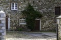 Medieval agricultural buildings are often constructed from locally available building materials, such as natural stone and wood.