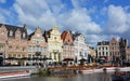 Medieval buildings over Graslei harbor on Leie river in Ghent