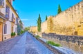 The medieval Calle Cairuan with preserved city wall, Cordoba, Spain Royalty Free Stock Photo