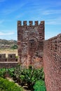 Medieval castle battlements and tower, Silves, Portugal. Royalty Free Stock Photo