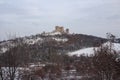 Medieval castle of Csesznek on the snowy hill Royalty Free Stock Photo