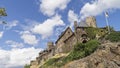 shot of a medieval castle in Germany on a fine sunny day under a blue sky with clouds Royalty Free Stock Photo