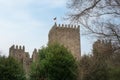 Medieval Castle of Guimaraes Tower and Portuguese Flag - Guimaraes, Portugal Royalty Free Stock Photo