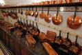 Medieval castle kitchen with old copperware. Royalty Free Stock Photo