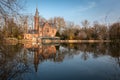 Medieval Castle on Love lake, Minnewater Park in Bruges, Belgium Royalty Free Stock Photo