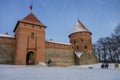 Medieval castle in Trakai, winter landscape, Vilnius County, Lit Royalty Free Stock Photo