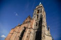 Medieval catholic church of Saint Jilji with gothic High clock tower in sunny autumn day, Nymburk, Central Bohemia, Czech Republic Royalty Free Stock Photo