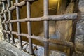 Medieval cellar prison iron bars grate Royalty Free Stock Photo