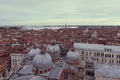 Medieval chaotic buildings in the city center around Piazza San Marco in Venice, Italy. Vintage style photo Royalty Free Stock Photo