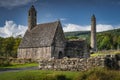 Medieval church, ancient graves, Celtic crosses in Glendalough Cemetery, Ireland