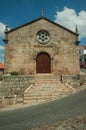 Medieval church facade with stone wall at Monsanto Royalty Free Stock Photo