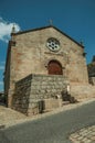 Medieval church facade with stone wall at Monsanto Royalty Free Stock Photo