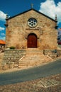 Medieval church facade with stone wall at Monsanto Royalty Free Stock Photo