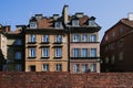 The medieval city wall and amazing old facade buildings in the Old Town of Warsaw city Royalty Free Stock Photo