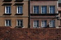 The medieval city wall and amazing old facade buildings in the Old Town of Warsaw city Royalty Free Stock Photo