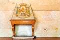 Medieval coat of arms decorating chimney in italian Palace