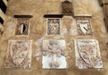 Medieval coat of arms on stone wall, Florence, Italy