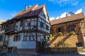 Medieval colorful half-timbered houses on an ancient street of small town Kaysersberg. France Royalty Free Stock Photo