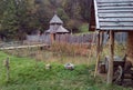 The medieval courtyard. Stockade. Wooden towers in the forest. Green grass