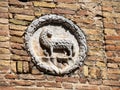 Medieval crest on the city walls of Volterra, Italy