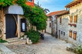 Medieval Croatian old street,with flowered entrance in Rovinj,Europe Royalty Free Stock Photo