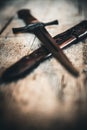 dagger in leather sheath on a wooden table Royalty Free Stock Photo