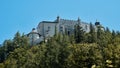 Medieval defensive castle Hohenwerfen on a hill above a forest in Austria Royalty Free Stock Photo