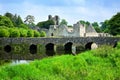 Medieval Desmond Castle, Ireland with stone bridge, Adare, County Limerick