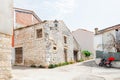 Medieval dilapidated house at the crossroads in the historical part of Rovinj