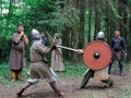 The medieval duel of two Viking warriors.