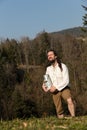 Medieval farmer with milk can in the nature Royalty Free Stock Photo