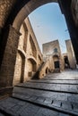 Medieval fortress. Arch and climb stairs. Italian historic architecture. Royalty Free Stock Photo