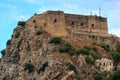 Medieval fortress the Ruffo Castle on mountain rock in sea. Southern Italy Calabria region. Royalty Free Stock Photo