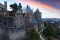 Medieval fortress walls in twilight time. Carcassonne Royalty Free Stock Photo