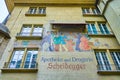 Medieval fresco of Apotheke Scheidegger on the wall of the townhouse in old Bern, Switzerland