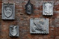 Bas Relief sculptures on brick wall on the island of Torcello, Venice, Italy