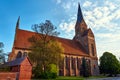 Medieval Gothic church with a bell tower in Friedland